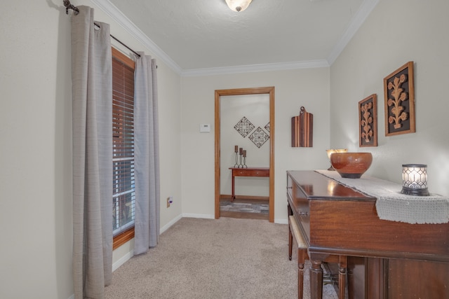 hallway with ornamental molding and light carpet