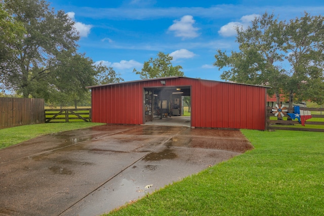 view of outdoor structure featuring a yard