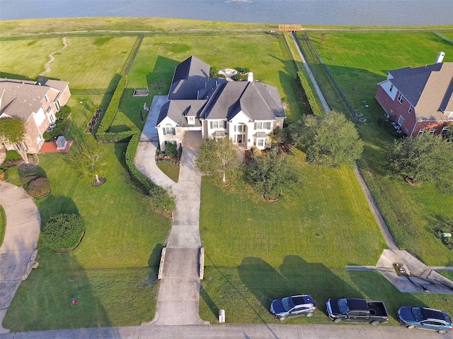 aerial view featuring a rural view and a water view