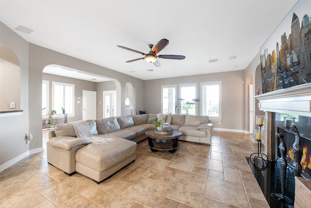 living room featuring ceiling fan