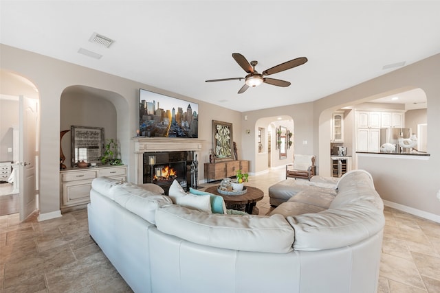 living room with ceiling fan