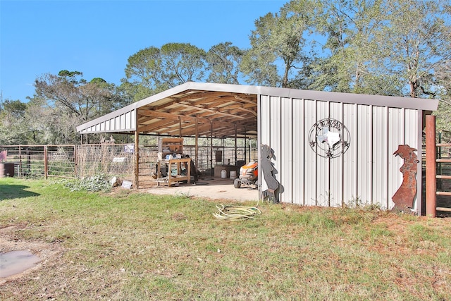 view of outdoor structure with a lawn