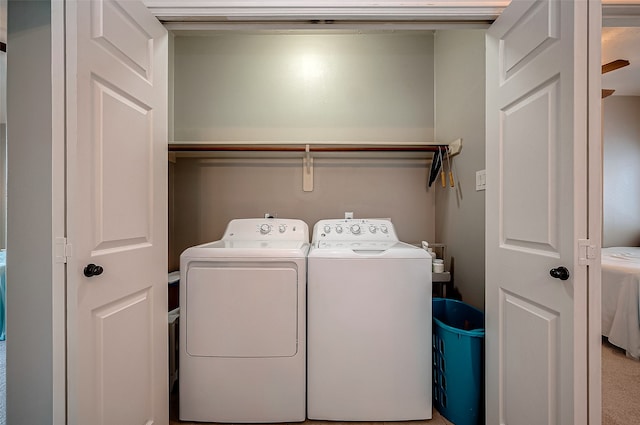 laundry area featuring separate washer and dryer