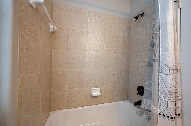 bathroom with shower / bath combo