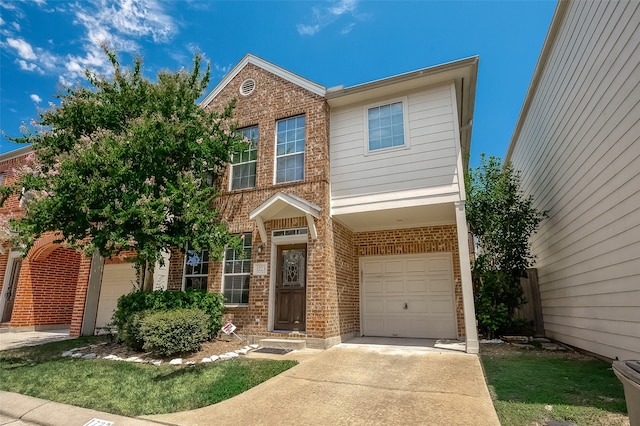 view of front of property with a garage