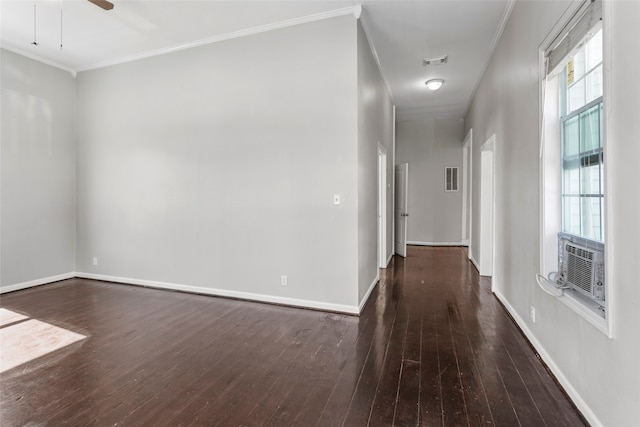 interior space featuring cooling unit, crown molding, ceiling fan, and dark wood-type flooring