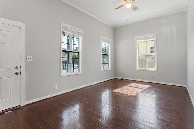 spare room featuring dark hardwood / wood-style floors, ceiling fan, and ornamental molding