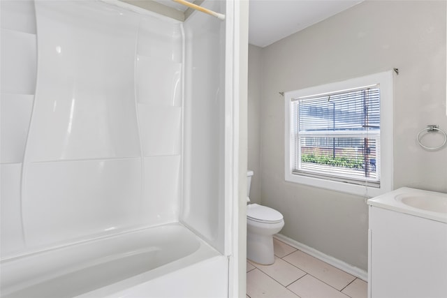 full bathroom featuring vanity, toilet, tile patterned flooring, and washtub / shower combination