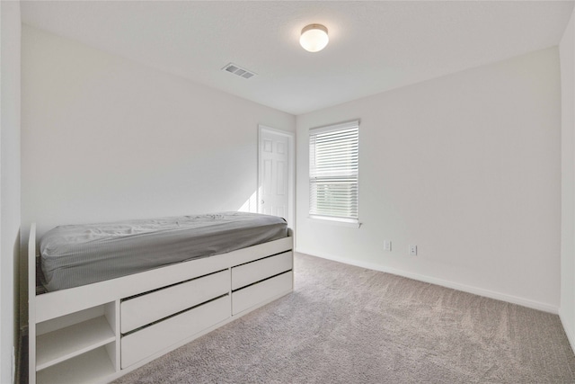 unfurnished bedroom featuring carpet