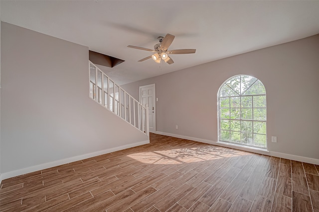 interior space with ceiling fan and light hardwood / wood-style flooring