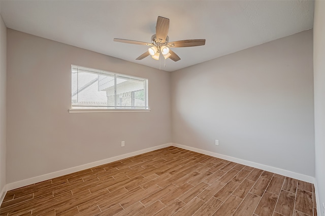 unfurnished room featuring light hardwood / wood-style floors and ceiling fan