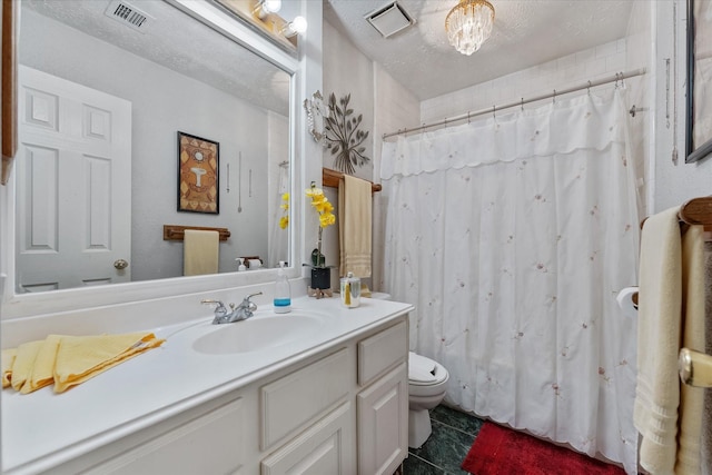 bathroom with visible vents, curtained shower, toilet, and vanity