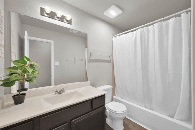 full bathroom with wood-type flooring, vanity, toilet, and shower / tub combo with curtain