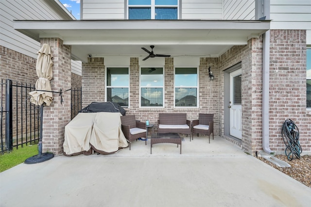 view of patio / terrace featuring ceiling fan