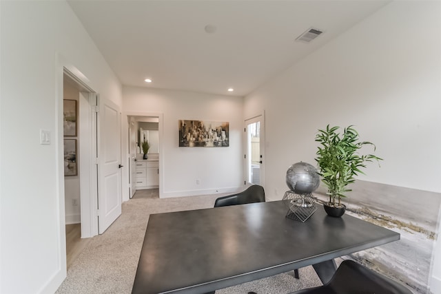 home office with light carpet