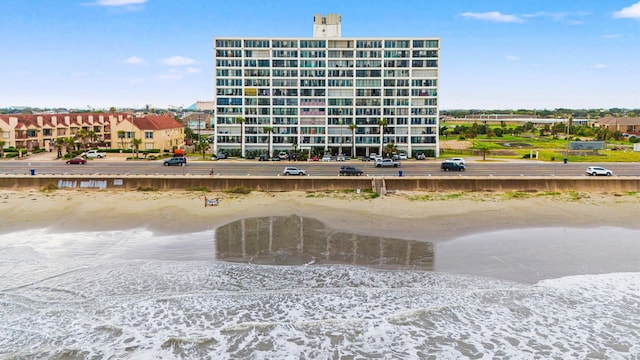 view of building exterior featuring a water view