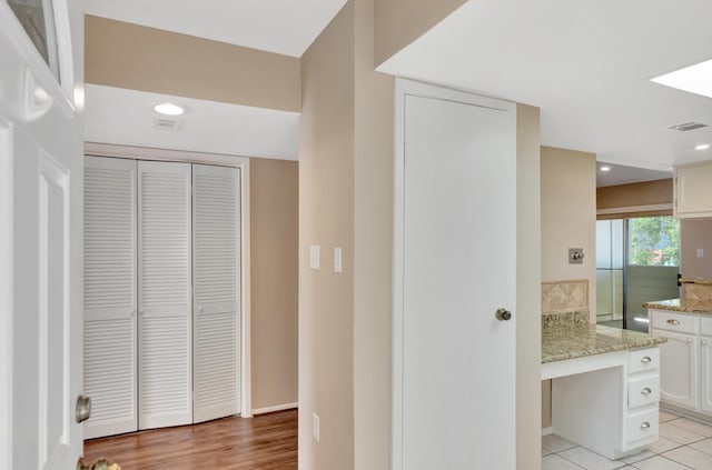 bathroom featuring wood-type flooring