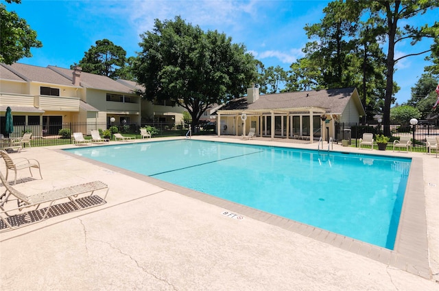 view of pool featuring a patio area