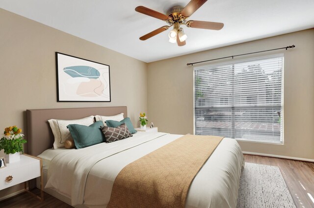 bedroom featuring ceiling fan and hardwood / wood-style floors