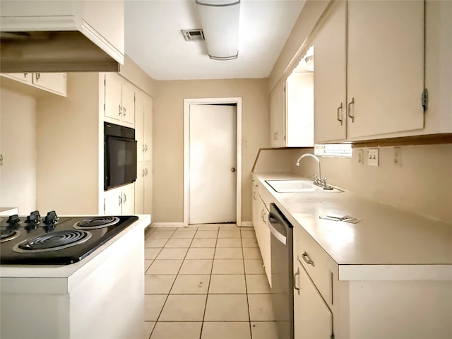 kitchen featuring black oven, light tile patterned floors, sink, white cabinets, and dishwasher