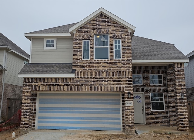 view of property with a garage