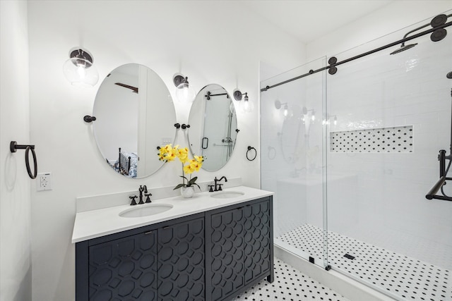 bathroom featuring walk in shower and vanity