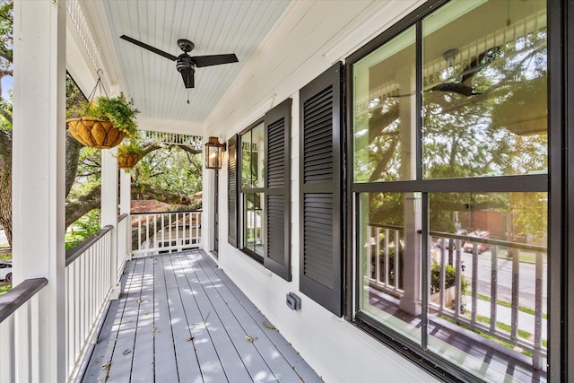 wooden terrace with ceiling fan