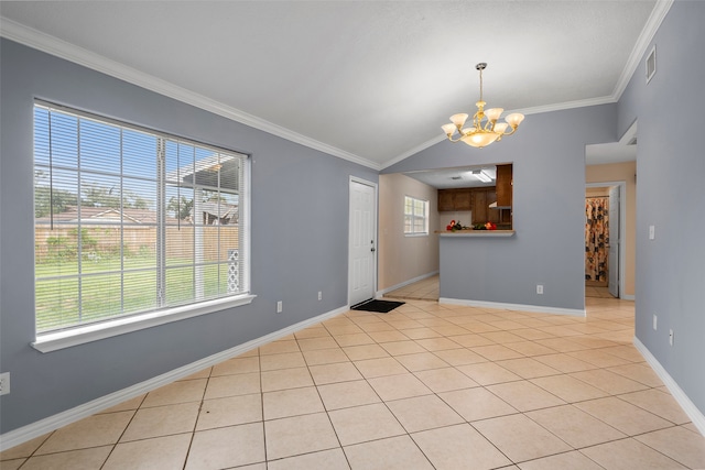 interior space with lofted ceiling, an inviting chandelier, and crown molding