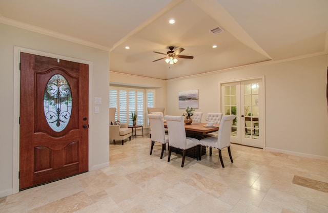 dining room featuring ceiling fan and crown molding