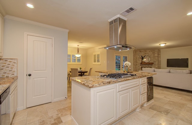 kitchen featuring island exhaust hood, stainless steel appliances, hanging light fixtures, white cabinets, and a center island