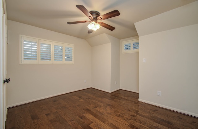 additional living space featuring dark hardwood / wood-style flooring and ceiling fan