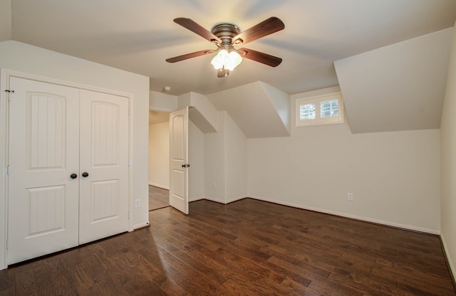 bonus room featuring dark wood-type flooring and ceiling fan