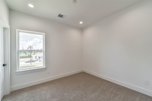 empty room featuring carpet flooring