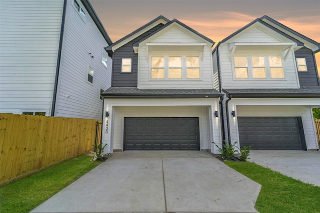 view of front of property with a garage