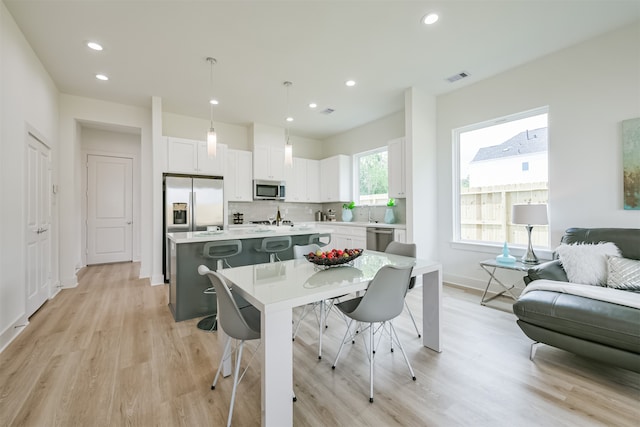 dining area featuring light hardwood / wood-style floors