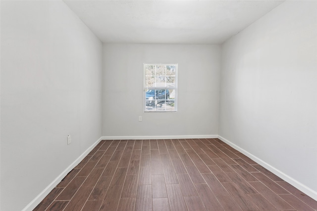 unfurnished room featuring dark hardwood / wood-style floors