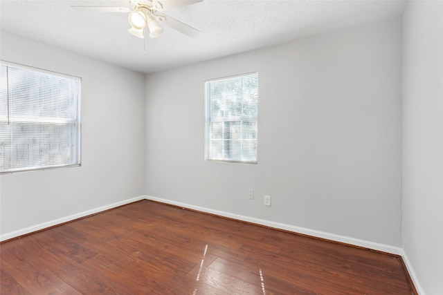 unfurnished room featuring a textured ceiling, hardwood / wood-style flooring, and ceiling fan