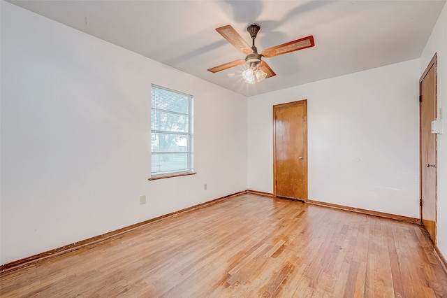 unfurnished bedroom with ceiling fan and light hardwood / wood-style flooring