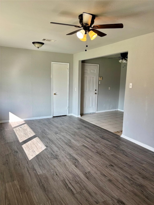 unfurnished room featuring wood-type flooring