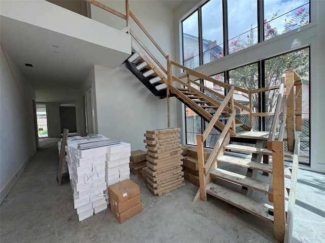 1606 Hazard St, Houston, TX 77019 - stairway with a towering ceiling and baseboards