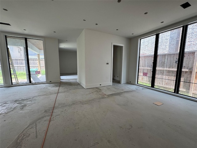 1606 Hazard St, Houston, TX 77019 - spare room with concrete flooring