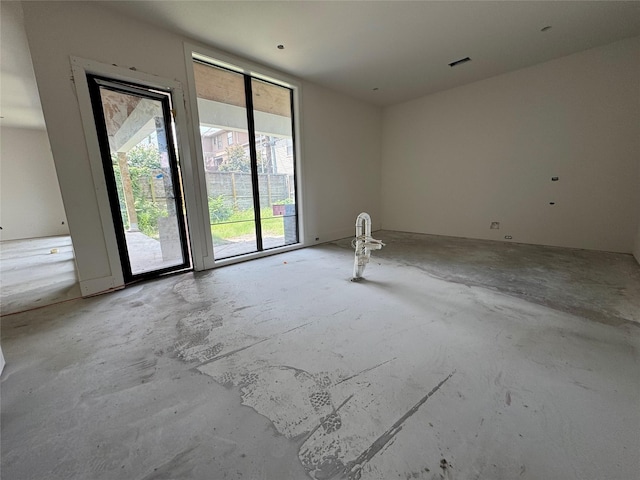 1606 Hazard St, Houston, TX 77019 - empty room with concrete flooring