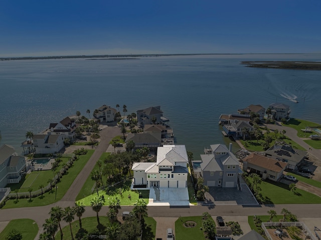 bird's eye view with a water view and a residential view