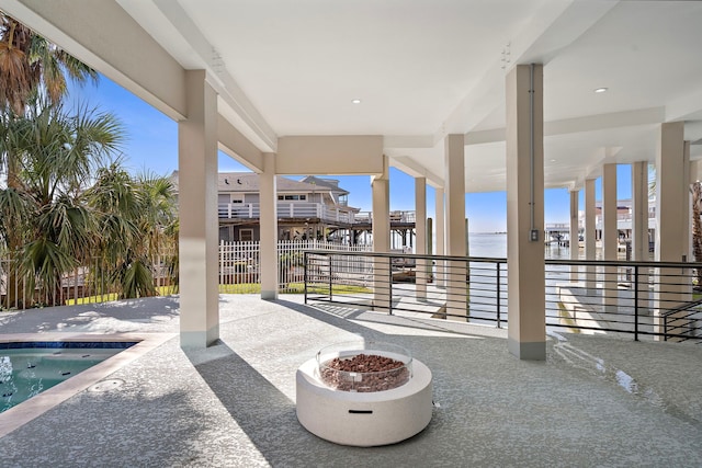 view of patio / terrace featuring a fire pit