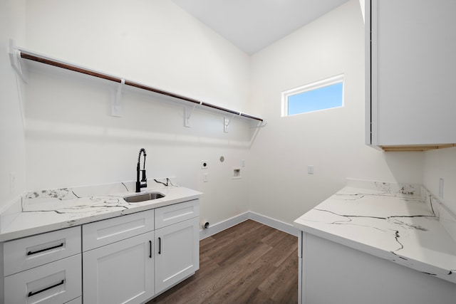 laundry room featuring sink, dark wood-type flooring, cabinets, hookup for an electric dryer, and hookup for a washing machine