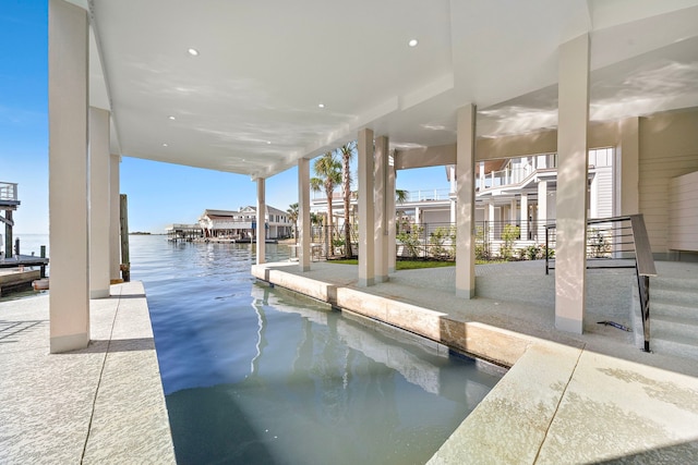 outdoor pool featuring a water view