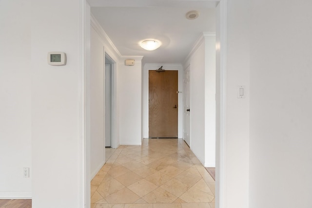 corridor featuring ornamental molding