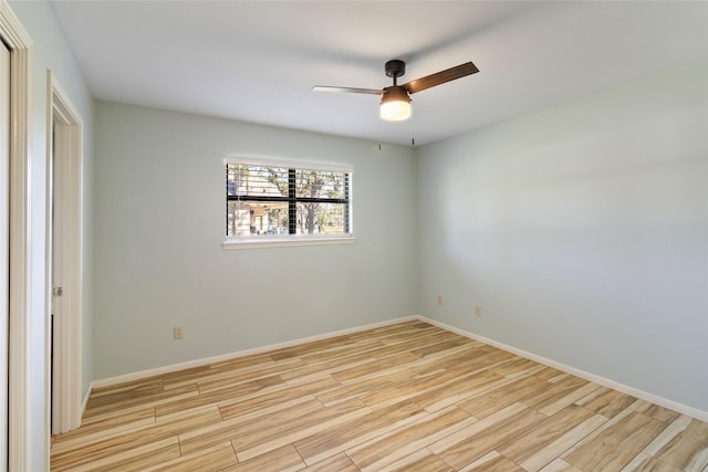 unfurnished room featuring ceiling fan and light hardwood / wood-style flooring