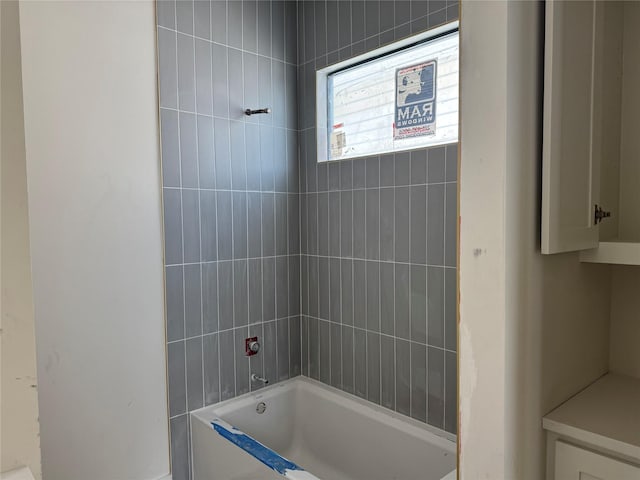 bathroom featuring shower / washtub combination