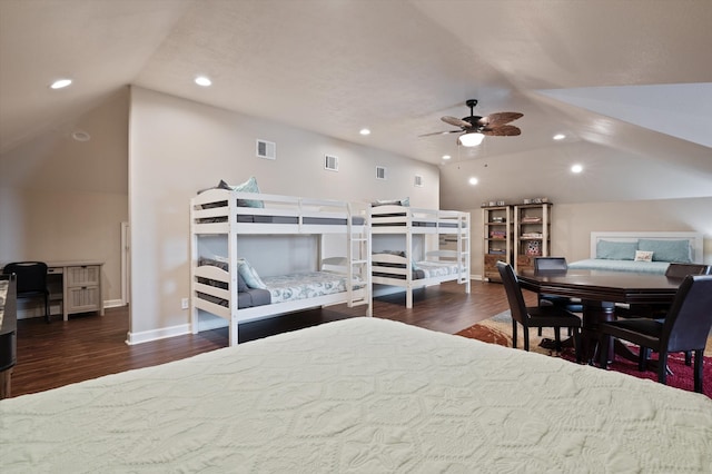 bedroom with lofted ceiling, ceiling fan, and dark hardwood / wood-style flooring